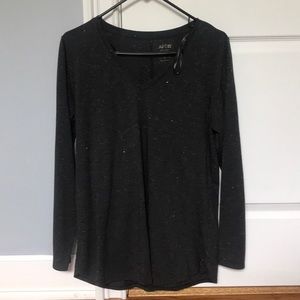 Black long sleeve with gold specks.